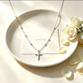 Collier croix argenté