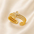 Bague dorée croix.zircon