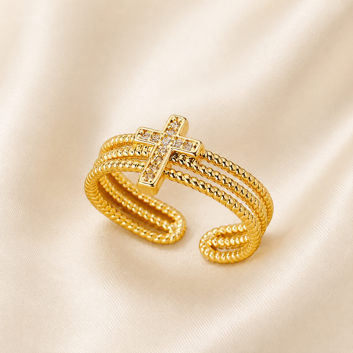 Bague dorée croix.zircon