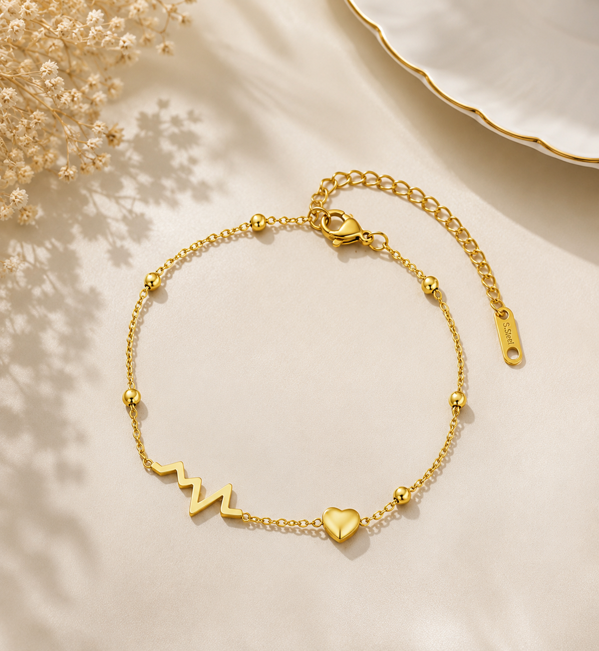 Bracelet battement de coeur dorée